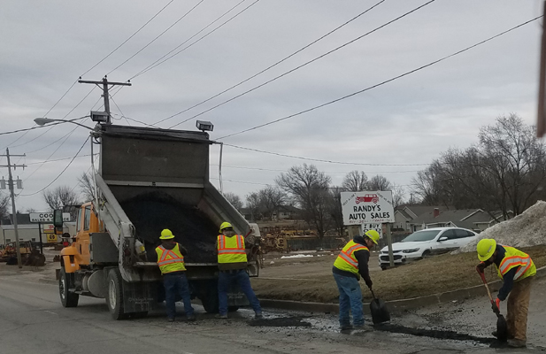 Fixing & Reporting Potholes