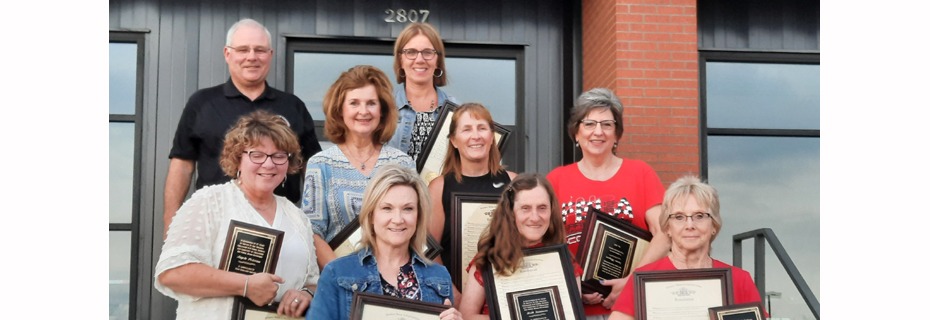 School Board Honors 13 Retirees