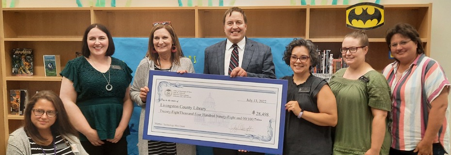 Secretary of State Delivers Grant Funds to Youth Library